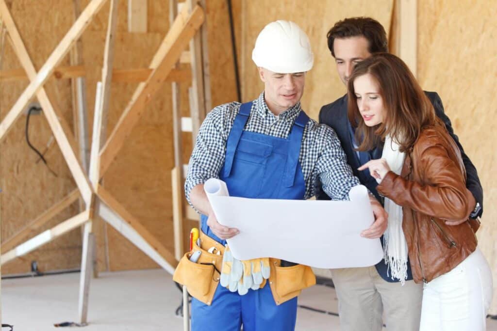 A home builder meets with potential leads